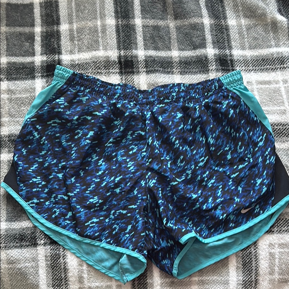 Blue/black patterned Nike shorts